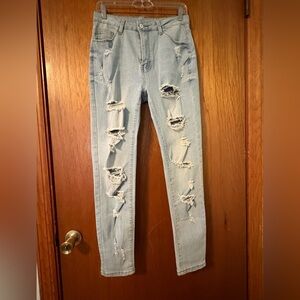 Light Blue Distressed Women's Jeans - Slim Fit